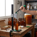 Manual Bench Bottle Capper in use